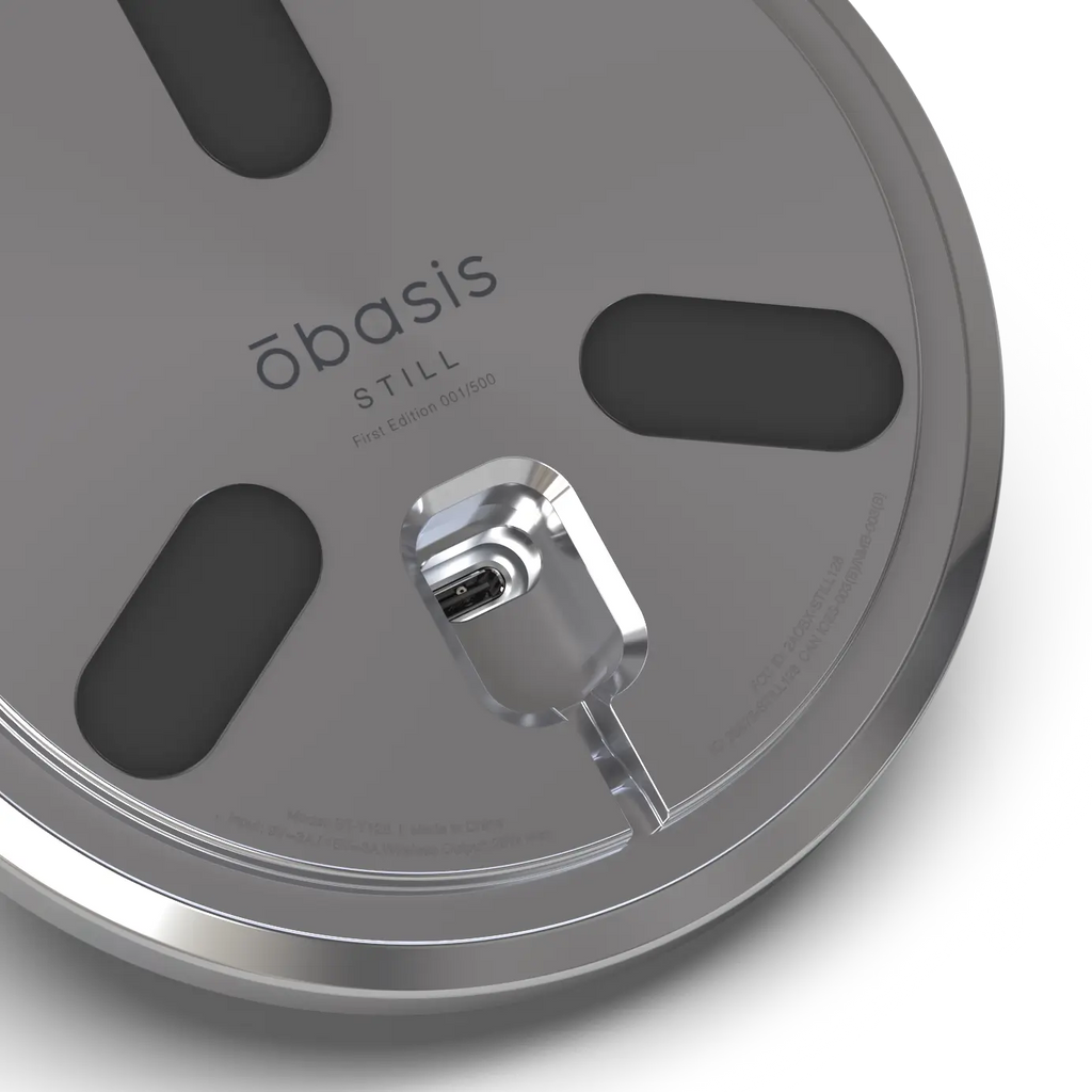 Close-up of the STILL stainless steel base showing the engraved First Edition serial number position.