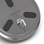 Close-up of the STILL stainless steel base showing the engraved First Edition serial number position.